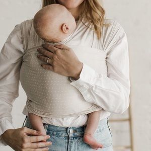 Ajj x Solly baby wrap cream color with white plus signs